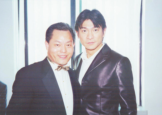 Mr. Andy Lau, the international song and film star, and the Dr.Allan Wong took a group photo.